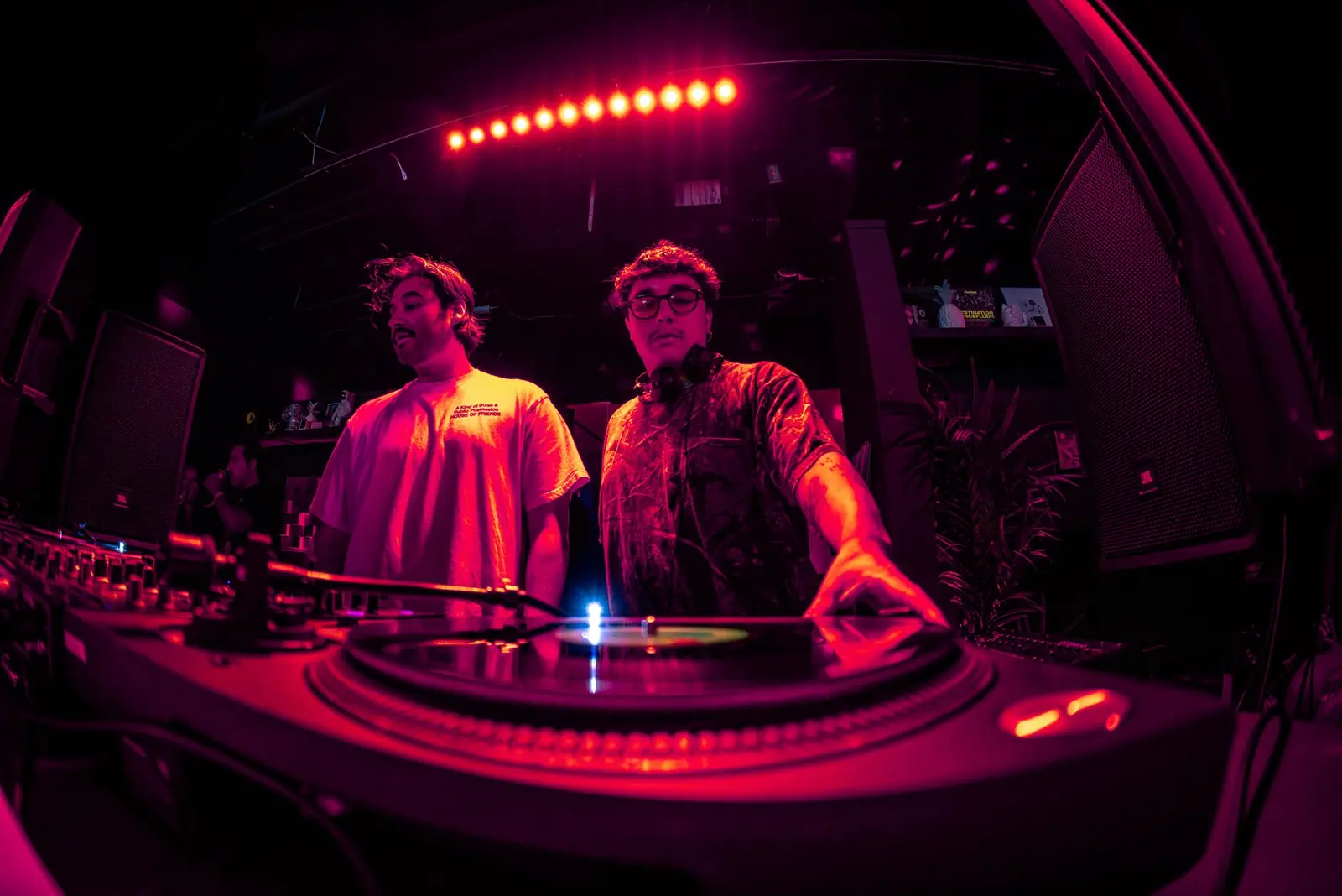Two DJs playing back to back on the Foot Work booth