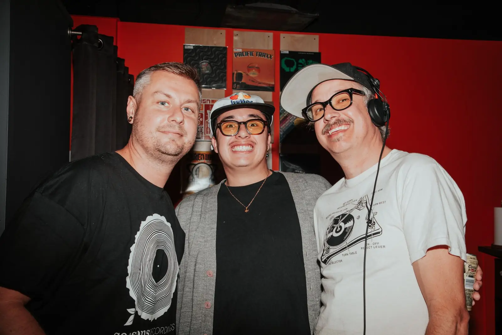 Selectors and friends behind the booth after a set